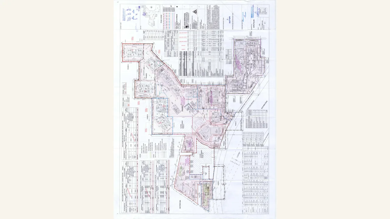 The rendered approved plan covers the larger Krisumi Phase 5/6 and parent colony layout with multiple building and area schedules; it is not Forest Reserve-II-only.