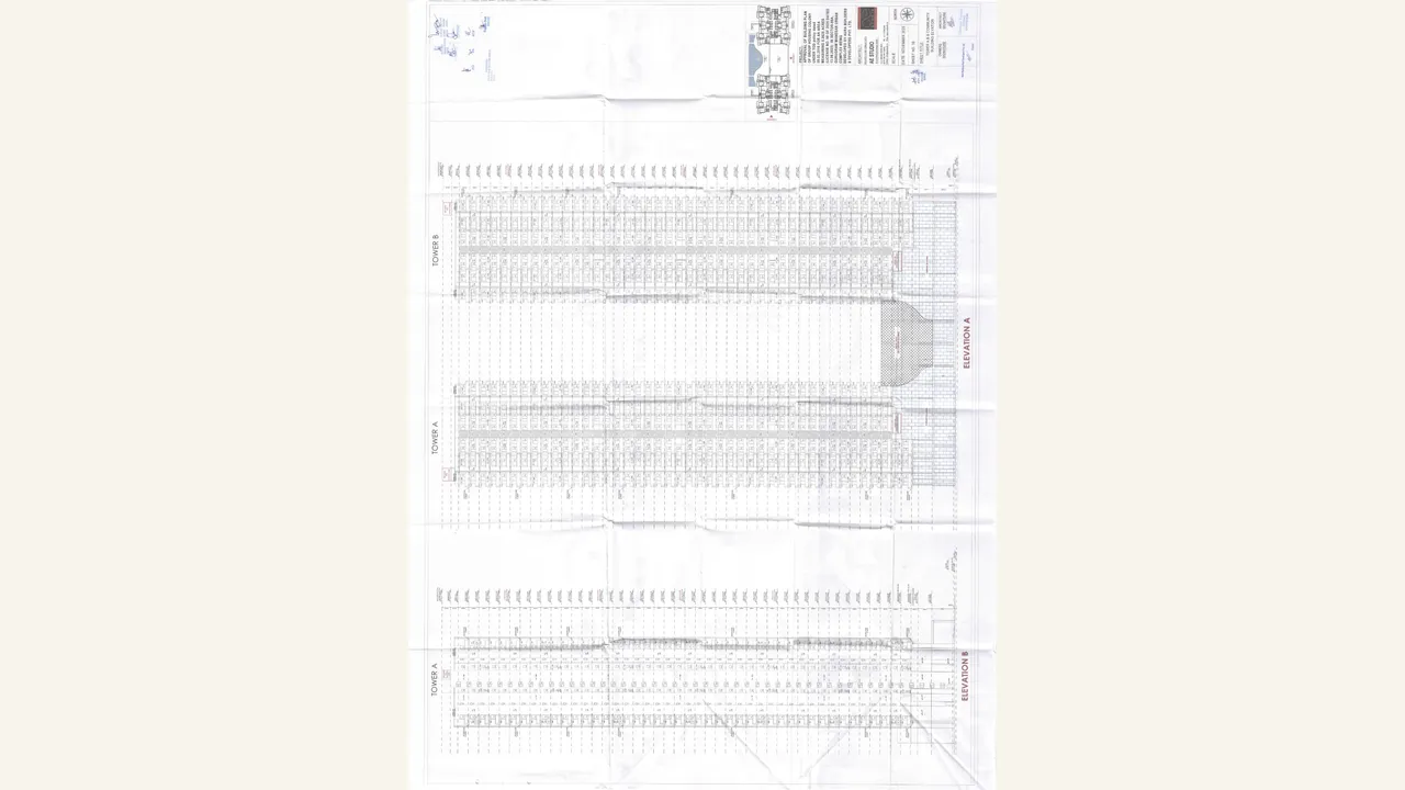 Tower A, Tower B and community-building elevation visually verified for The Oryza